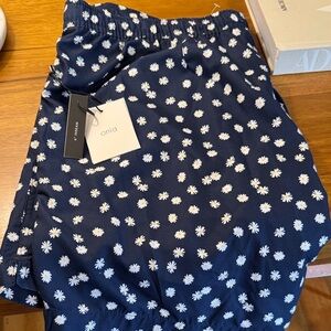 Onia Dark Blue Floral Patterned Swim shorts. Mens.